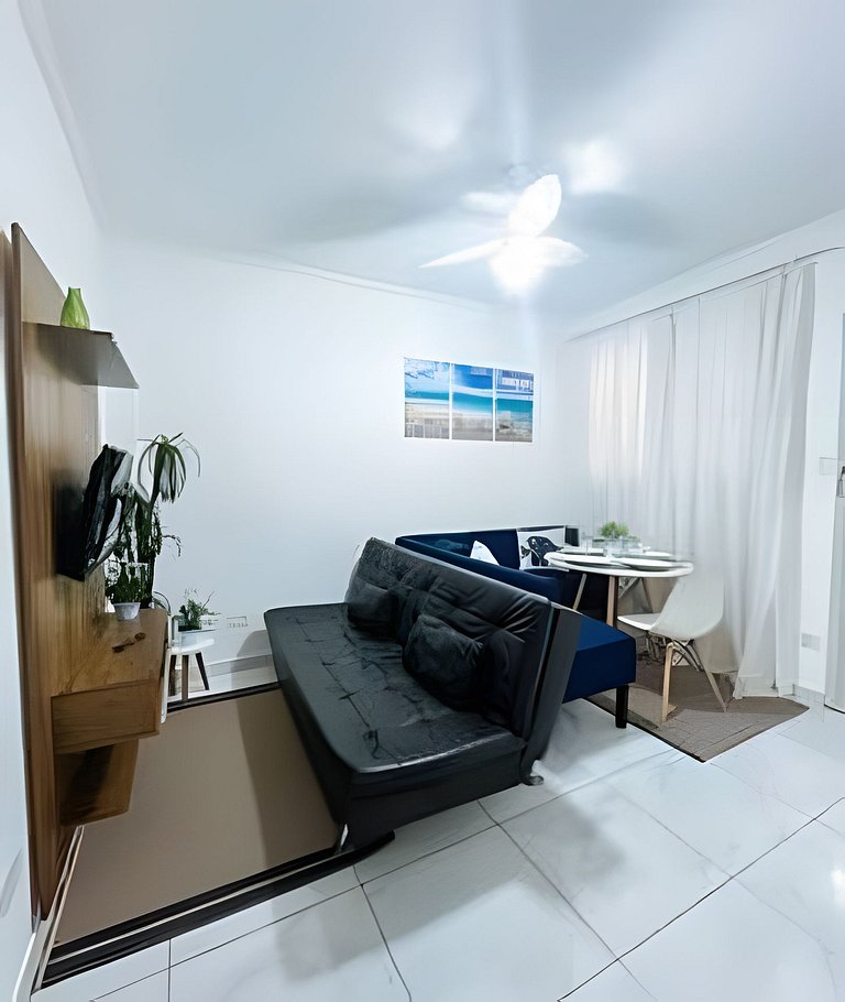 Pé na areia: 50m da praia com vaga de garagem!