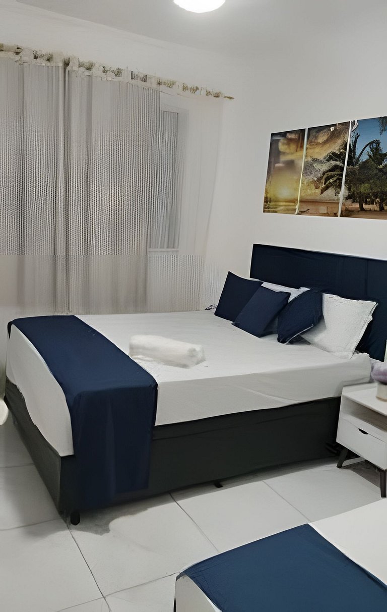 Pé na areia: 50m da praia com vaga de garagem!