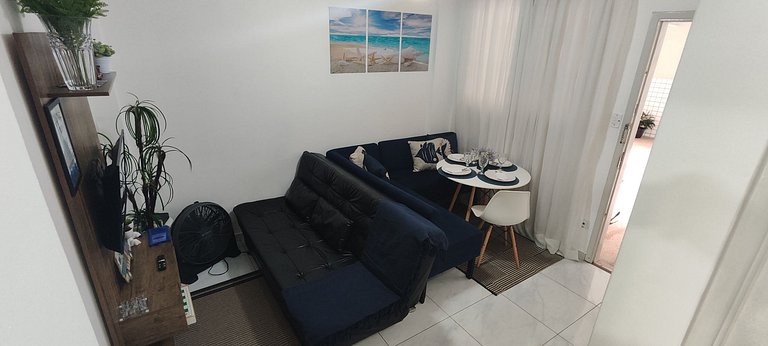 Pé na areia: 50m da praia com vaga de garagem!