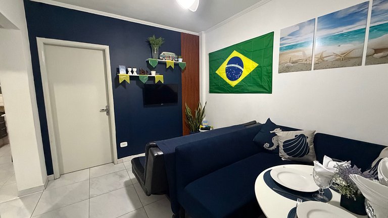 Pé na areia: 50m da praia com vaga de garagem!